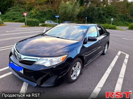 Черный Тойота Камри, объемом двигателя 2.5 л и пробегом 280 тыс. км за 11000 $, фото 1 на Automoto.ua