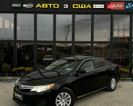 Черный Тойота Камри, объемом двигателя 2.49 л и пробегом 168 тыс. км за 10900 $, фото 1 на Automoto.ua