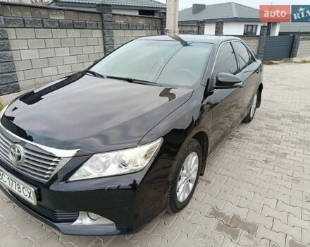Чорний Тойота Камрі, об'ємом двигуна 2.5 л та пробігом 176 тис. км за 13499 $, фото 1 на Automoto.ua