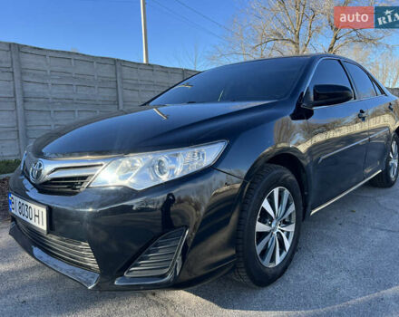 Чорний Тойота Камрі, об'ємом двигуна 2.5 л та пробігом 155 тис. км за 12000 $, фото 1 на Automoto.ua
