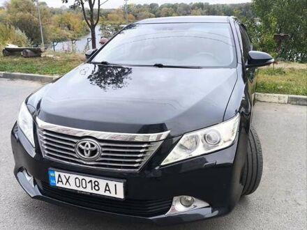 Черный Тойота Камри, объемом двигателя 2.5 л и пробегом 205 тыс. км за 14300 $, фото 1 на Automoto.ua