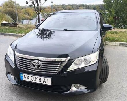 Черный Тойота Камри, объемом двигателя 2.5 л и пробегом 205 тыс. км за 14300 $, фото 1 на Automoto.ua