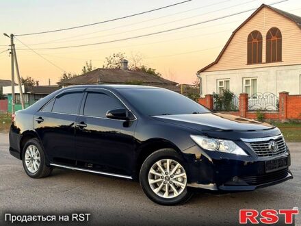 Черный Тойота Камри, объемом двигателя 2.5 л и пробегом 178 тыс. км за 12350 $, фото 1 на Automoto.ua