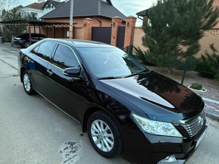 Черный Тойота Камри, объемом двигателя 2.4 л и пробегом 170 тыс. км за 13200 $, фото 1 на Automoto.ua