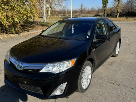 Черный Тойота Камри, объемом двигателя 2.49 л и пробегом 215 тыс. км за 13800 $, фото 1 на Automoto.ua