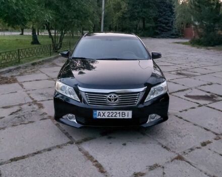 Черный Тойота Камри, объемом двигателя 2.5 л и пробегом 242 тыс. км за 13000 $, фото 1 на Automoto.ua