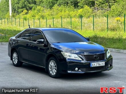 Чорний Тойота Камрі, об'ємом двигуна 2.5 л та пробігом 250 тис. км за 13500 $, фото 1 на Automoto.ua