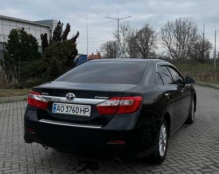 Черный Тойота Камри, объемом двигателя 2.5 л и пробегом 239 тыс. км за 12600 $, фото 1 на Automoto.ua