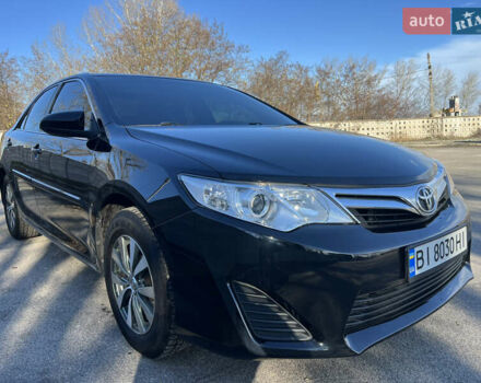 Черный Тойота Камри, объемом двигателя 2.5 л и пробегом 158 тыс. км за 12000 $, фото 1 на Automoto.ua
