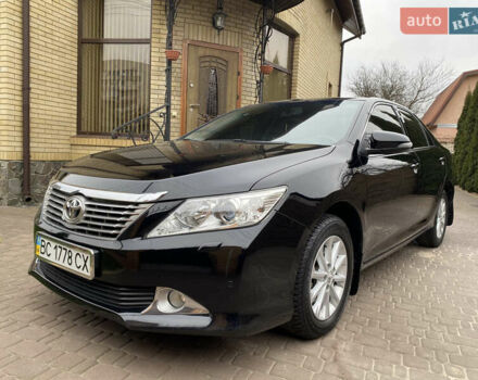 Черный Тойота Камри, объемом двигателя 2.5 л и пробегом 177 тыс. км за 14700 $, фото 1 на Automoto.ua