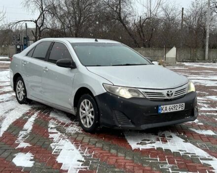 Черный Тойота Камри, объемом двигателя 2.5 л и пробегом 270 тыс. км за 4550 $, фото 1 на Automoto.ua