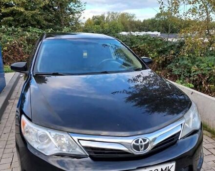 Черный Тойота Камри, объемом двигателя 2.5 л и пробегом 280 тыс. км за 12000 $, фото 1 на Automoto.ua