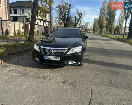 Черный Тойота Камри, объемом двигателя 2.49 л и пробегом 165 тыс. км за 12700 $, фото 1 на Automoto.ua