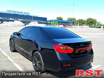 Чорний Тойота Камрі, об'ємом двигуна 2.5 л та пробігом 238 тис. км за 14700 $, фото 1 на Automoto.ua