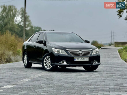 Черный Тойота Камри, объемом двигателя 2.5 л и пробегом 260 тыс. км за 10899 $, фото 1 на Automoto.ua