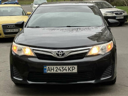 Черный Тойота Камри, объемом двигателя 2.49 л и пробегом 142 тыс. км за 11500 $, фото 1 на Automoto.ua