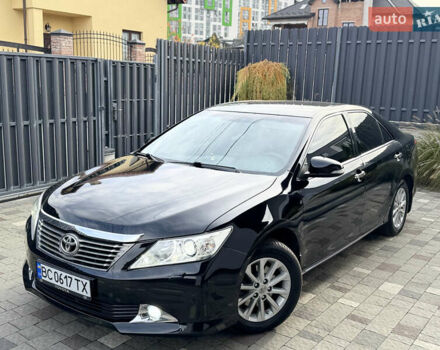 Черный Тойота Камри, объемом двигателя 2.5 л и пробегом 255 тыс. км за 13500 $, фото 1 на Automoto.ua