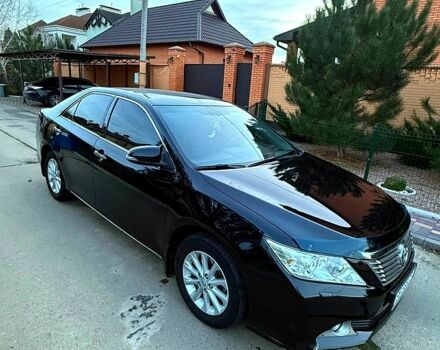 Черный Тойота Камри, объемом двигателя 2.5 л и пробегом 173 тыс. км за 14550 $, фото 1 на Automoto.ua