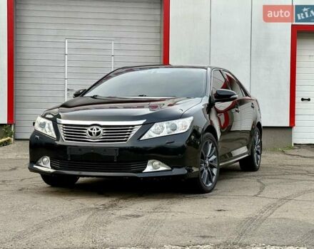 Черный Тойота Камри, объемом двигателя 2.5 л и пробегом 170 тыс. км за 13900 $, фото 1 на Automoto.ua