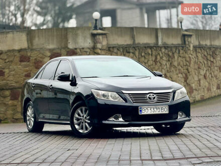 Чорний Тойота Камрі, об'ємом двигуна 2.5 л та пробігом 251 тис. км за 10999 $, фото 1 на Automoto.ua
