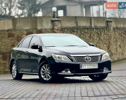 Чорний Тойота Камрі, об'ємом двигуна 2.5 л та пробігом 251 тис. км за 10999 $, фото 1 на Automoto.ua