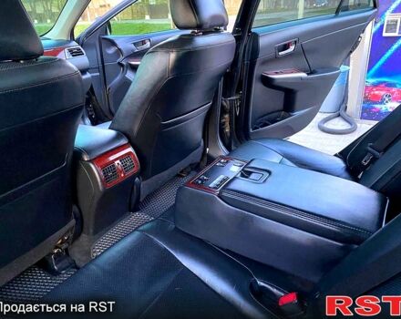 Черный Тойота Камри, объемом двигателя 2.5 л и пробегом 236 тыс. км за 14500 $, фото 1 на Automoto.ua