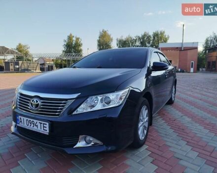 Черный Тойота Камри, объемом двигателя 2.5 л и пробегом 187 тыс. км за 13200 $, фото 1 на Automoto.ua