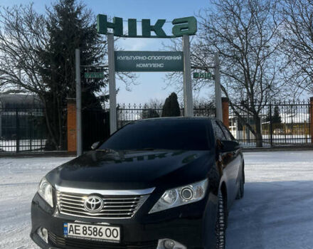 Черный Тойота Камри, объемом двигателя 2.49 л и пробегом 230 тыс. км за 15000 $, фото 1 на Automoto.ua
