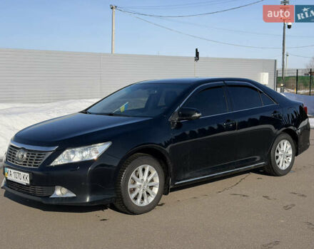 Черный Тойота Камри, объемом двигателя 2.49 л и пробегом 235 тыс. км за 13900 $, фото 1 на Automoto.ua