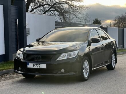 Черный Тойота Камри, объемом двигателя 2.5 л и пробегом 235 тыс. км за 10200 $, фото 1 на Automoto.ua