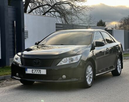 Черный Тойота Камри, объемом двигателя 2.5 л и пробегом 235 тыс. км за 10200 $, фото 1 на Automoto.ua