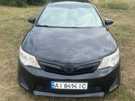Чорний Тойота Камрі, об'ємом двигуна 2.5 л та пробігом 250 тис. км за 10900 $, фото 1 на Automoto.ua