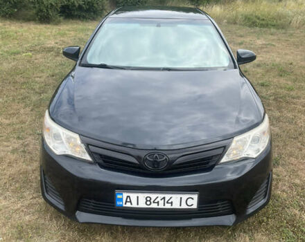 Чорний Тойота Камрі, об'ємом двигуна 2.5 л та пробігом 250 тис. км за 10900 $, фото 1 на Automoto.ua