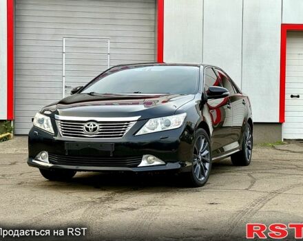 Черный Тойота Камри, объемом двигателя 2.5 л и пробегом 173 тыс. км за 13700 $, фото 1 на Automoto.ua