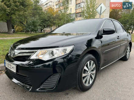 Черный Тойота Камри, объемом двигателя 2.5 л и пробегом 152 тыс. км за 12700 $, фото 1 на Automoto.ua