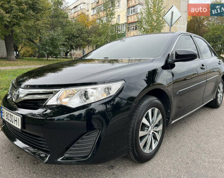 Чорний Тойота Камрі, об'ємом двигуна 2.5 л та пробігом 152 тис. км за 12700 $, фото 1 на Automoto.ua