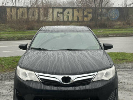 Черный Тойота Камри, объемом двигателя 2.49 л и пробегом 220 тыс. км за 7599 $, фото 1 на Automoto.ua