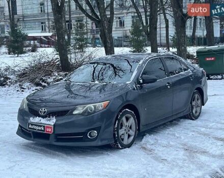 Черный Тойота Камри, объемом двигателя 2.5 л и пробегом 230 тыс. км за 11290 $, фото 1 на Automoto.ua