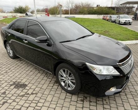 Черный Тойота Камри, объемом двигателя 2.5 л и пробегом 200 тыс. км за 9900 $, фото 1 на Automoto.ua