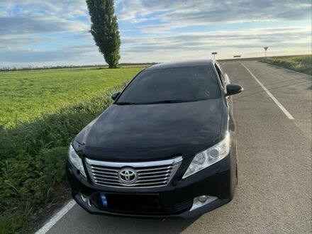 Чорний Тойота Камрі, об'ємом двигуна 2.5 л та пробігом 237 тис. км за 12900 $, фото 1 на Automoto.ua