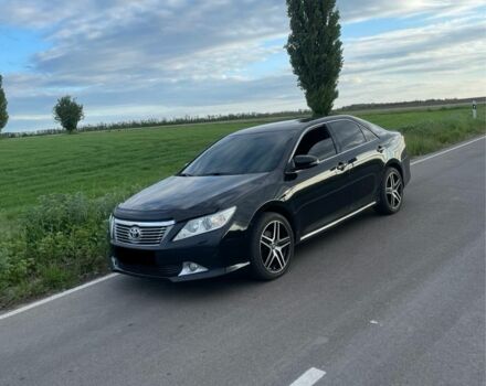 Черный Тойота Камри, объемом двигателя 2.5 л и пробегом 237 тыс. км за 14500 $, фото 1 на Automoto.ua