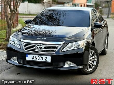 Черный Тойота Камри, объемом двигателя 2.5 л и пробегом 185 тыс. км за 12000 $, фото 1 на Automoto.ua