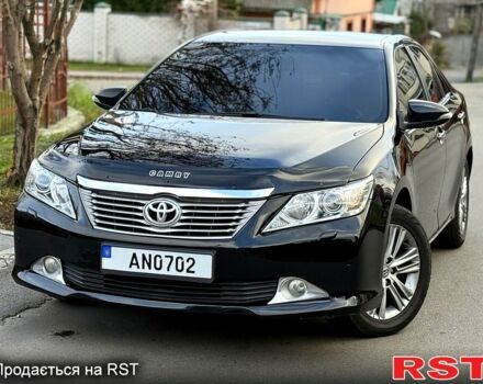 Черный Тойота Камри, объемом двигателя 2.5 л и пробегом 185 тыс. км за 12000 $, фото 1 на Automoto.ua