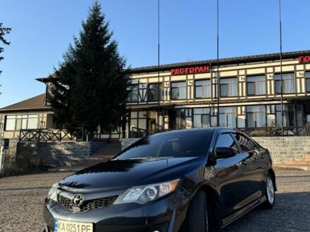 Черный Тойота Камри, объемом двигателя 2.5 л и пробегом 310 тыс. км за 12600 $, фото 1 на Automoto.ua
