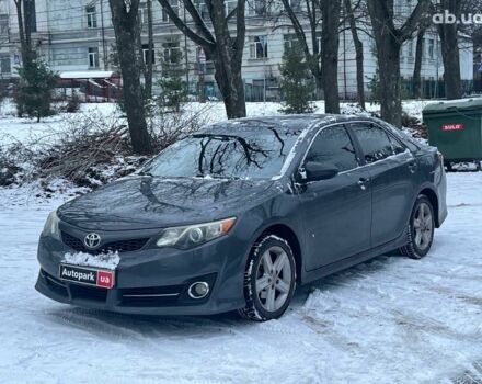 Черный Тойота Камри, объемом двигателя 2.5 л и пробегом 230 тыс. км за 11290 $, фото 1 на Automoto.ua