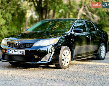 Чорний Тойота Камрі, об'ємом двигуна 2.49 л та пробігом 300 тис. км за 9300 $, фото 1 на Automoto.ua