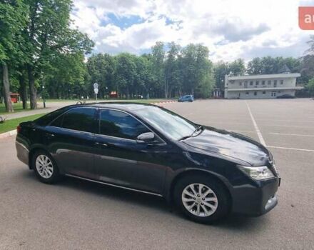 Черный Тойота Камри, объемом двигателя 2.5 л и пробегом 212 тыс. км за 12500 $, фото 1 на Automoto.ua