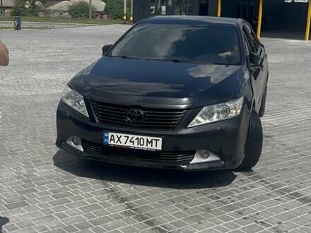 Черный Тойота Камри, объемом двигателя 2.49 л и пробегом 215 тыс. км за 14000 $, фото 1 на Automoto.ua
