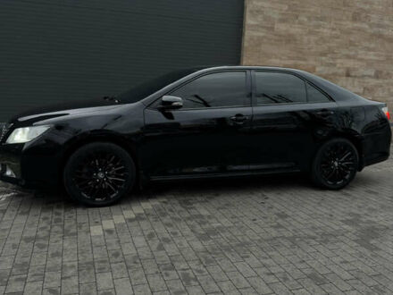 Черный Тойота Камри, объемом двигателя 2.49 л и пробегом 193 тыс. км за 15300 $, фото 1 на Automoto.ua