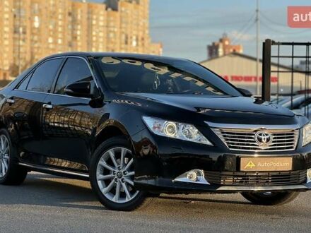 Черный Тойота Камри, объемом двигателя 2.5 л и пробегом 235 тыс. км за 16500 $, фото 1 на Automoto.ua